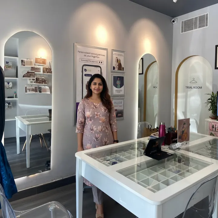 Inside a CloudTailor store: consultation desk and trial rooms