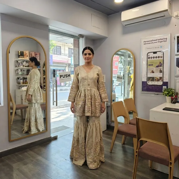 A customer trying on her CloudTailor outfit in store